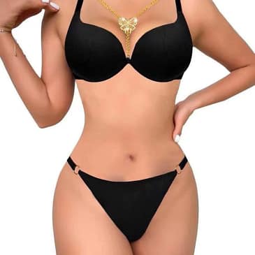 Close-up of the butterfly design and decorative necklace on the lingerie bra.